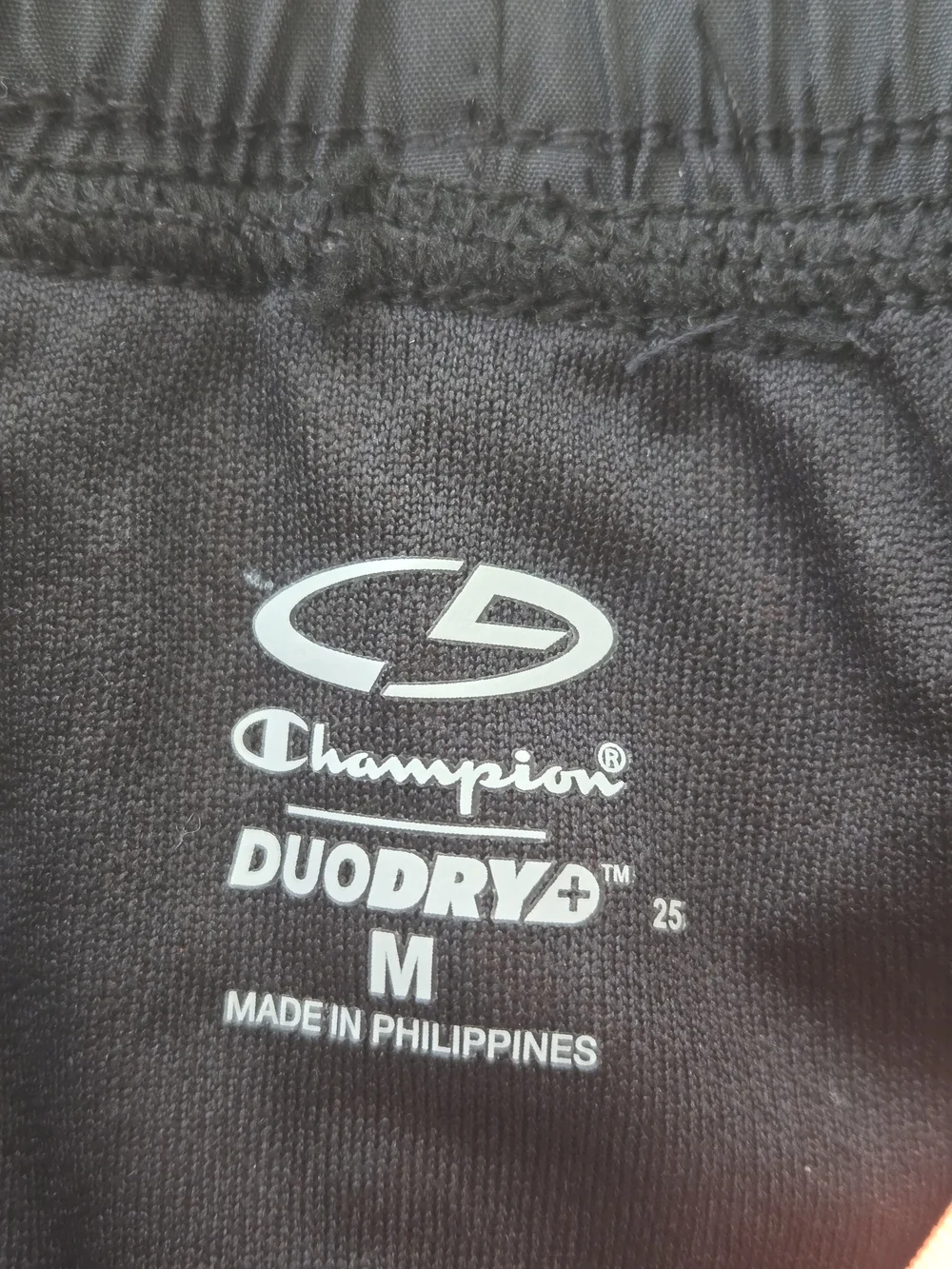 Champion Black Athletic Running Shorts with Neon Orange Geometric Print Size M